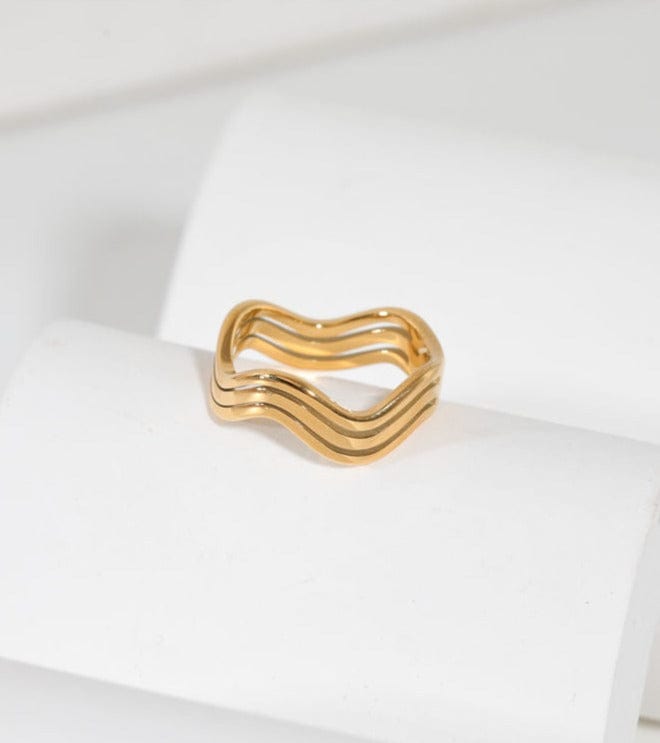 Livorno Triple Wave Layering Ring in 18k gold paved stainless steel, showcasing its elegant triple wave design.