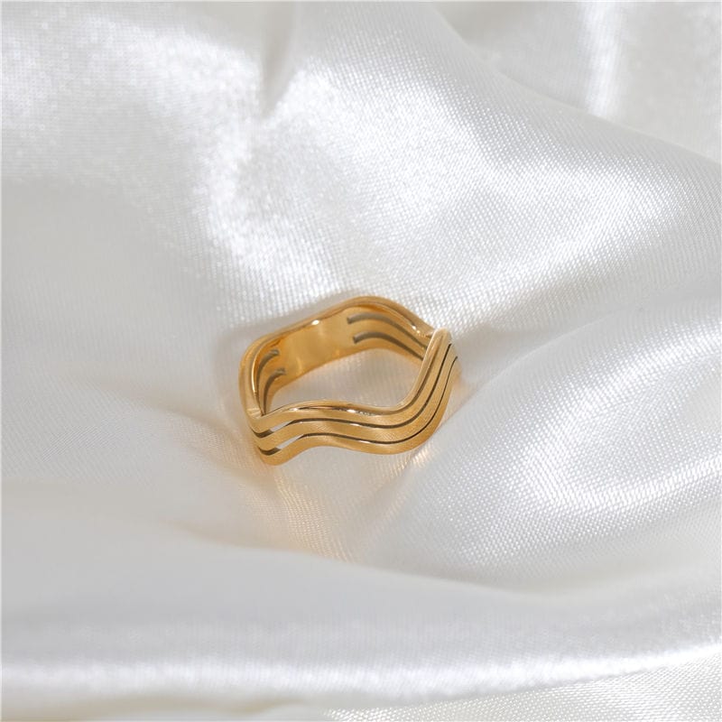 Livorno Triple Wave Layering Ring in 18k gold paved stainless steel, showcasing its elegant triple wave design.