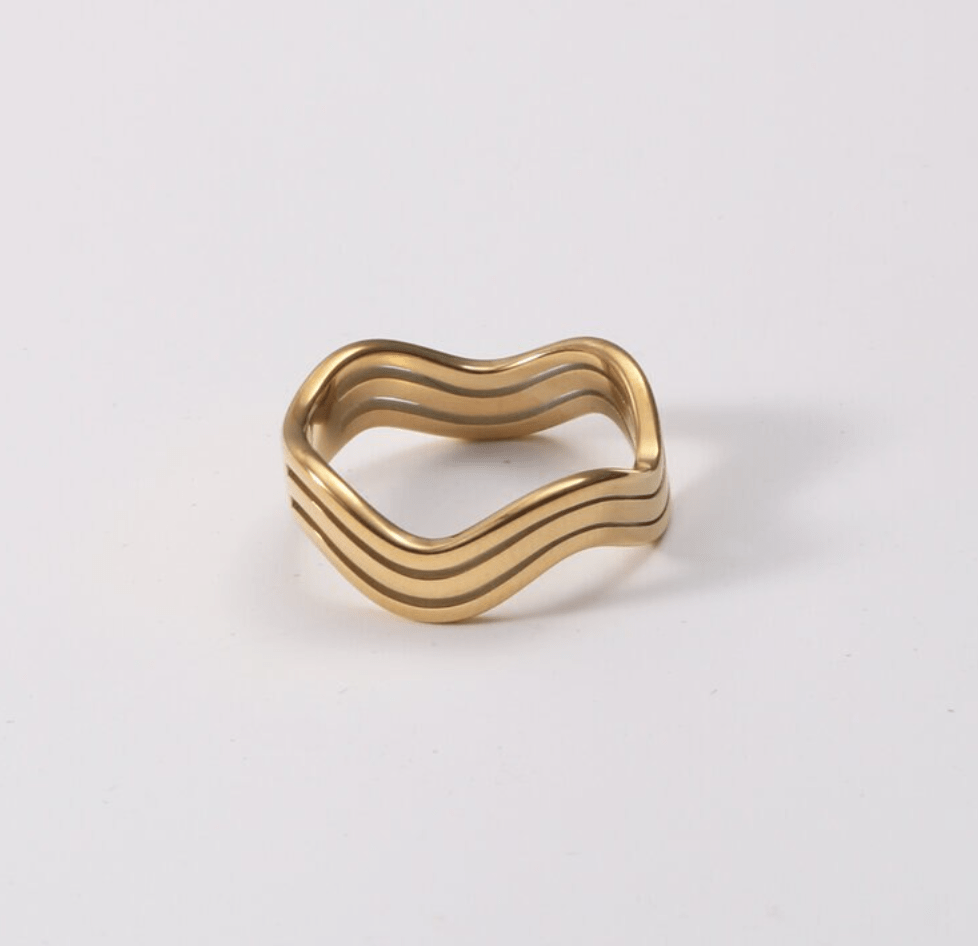 Livorno Triple Wave Layering Ring in 18k gold paved stainless steel, showcasing its elegant triple wave design.