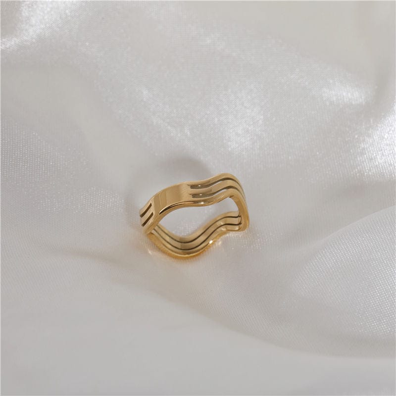 Livorno Triple Wave Layering Ring in 18k gold paved stainless steel, showcasing its elegant triple wave design.