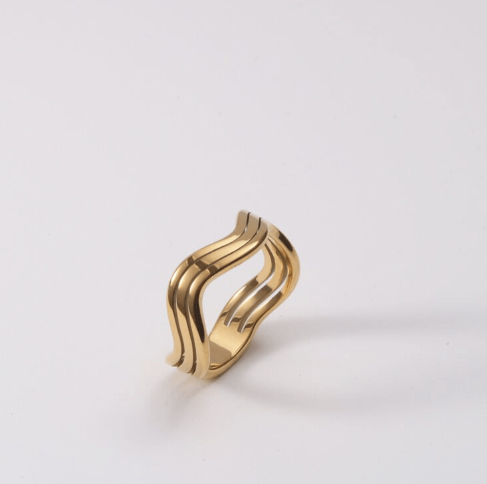 Livorno Triple Wave Layering Ring in 18k gold paved stainless steel, showcasing its elegant triple wave design.