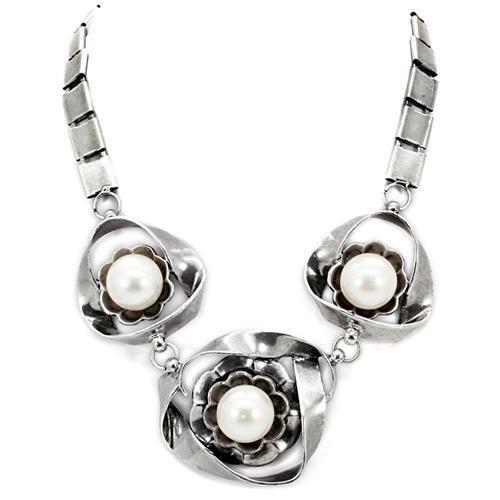 Antique silver white metal necklace featuring a synthetic pearl centerpiece, showcasing intricate design and elegant finish.