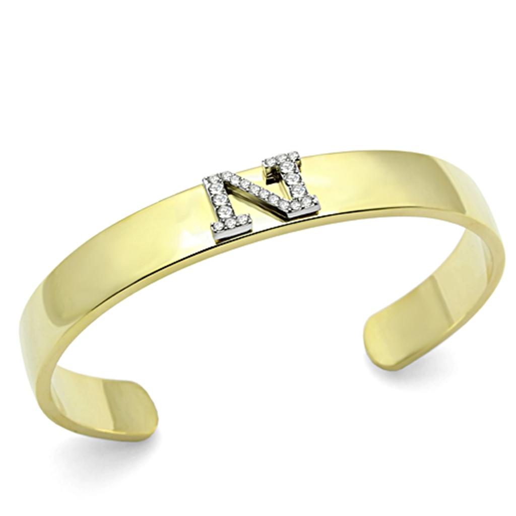 LO2583 Gold and Rhodium White Metal Bangle featuring a clear top grade crystal, showcasing elegance and sophistication.