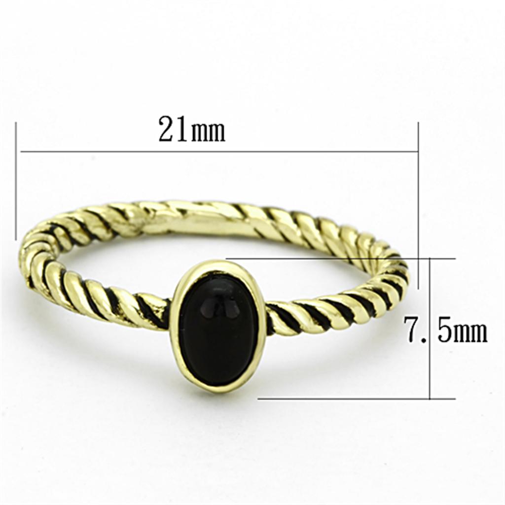 Gold brass ring featuring a synthetic onyx stone in jet black color, elegantly designed for stylish wear.