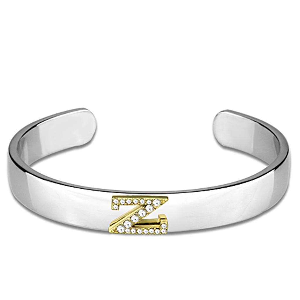 Silver bracelet with gold 'Z'.