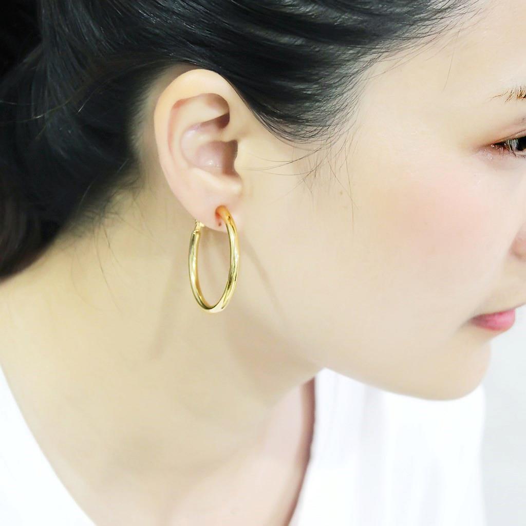 Elegant LO4682 Gold Brass Earrings with a minimalist design, featuring a shiny gold finish and no stones.