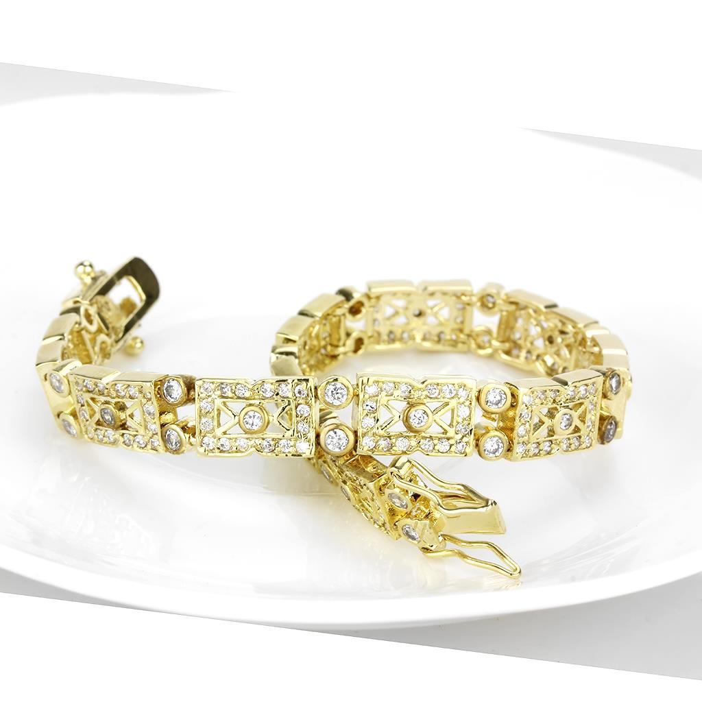 Gold brass bracelet featuring AAA grade clear cubic zirconia stone, elegantly designed for versatile wear.