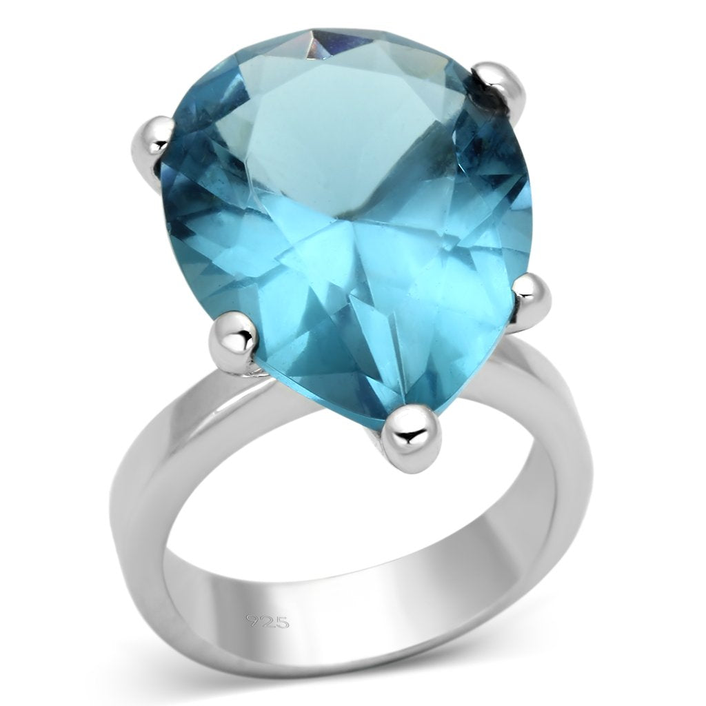 LOAS864 Rhodium 925 Sterling Silver Ring featuring a sea blue synthetic glass stone, elegantly designed for modern jewelry lovers.