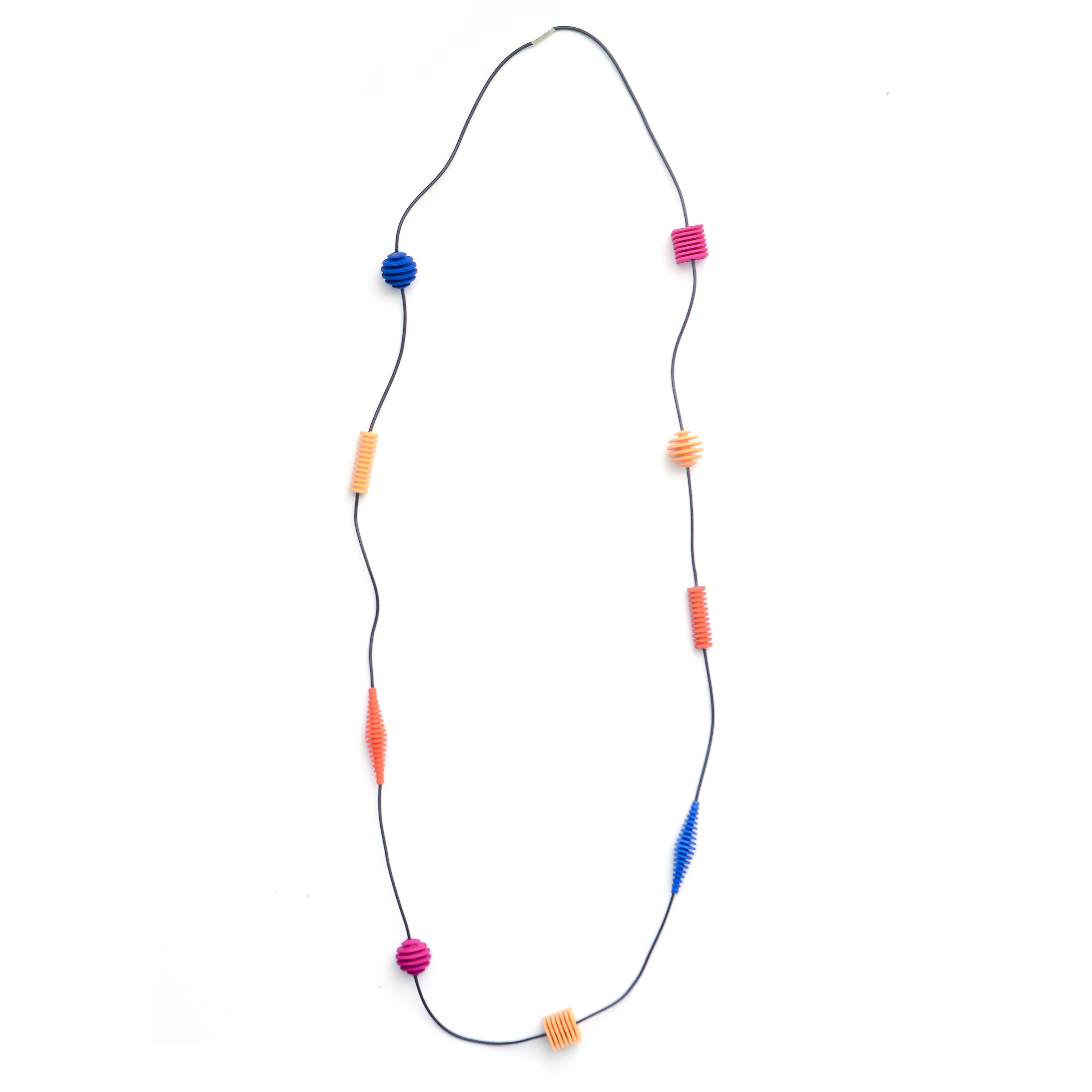 Long Beaded Optical Necklace featuring vibrant hand-dyed beads in geometric shapes, perfect for stylish outfits.