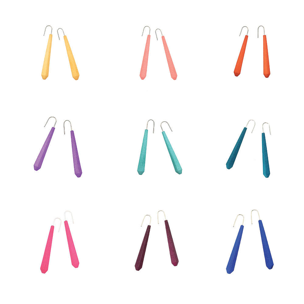 Long Pentagon Earrings in vibrant colors, featuring a geometric design with sterling silver hooks, displayed in a fabric pouch.