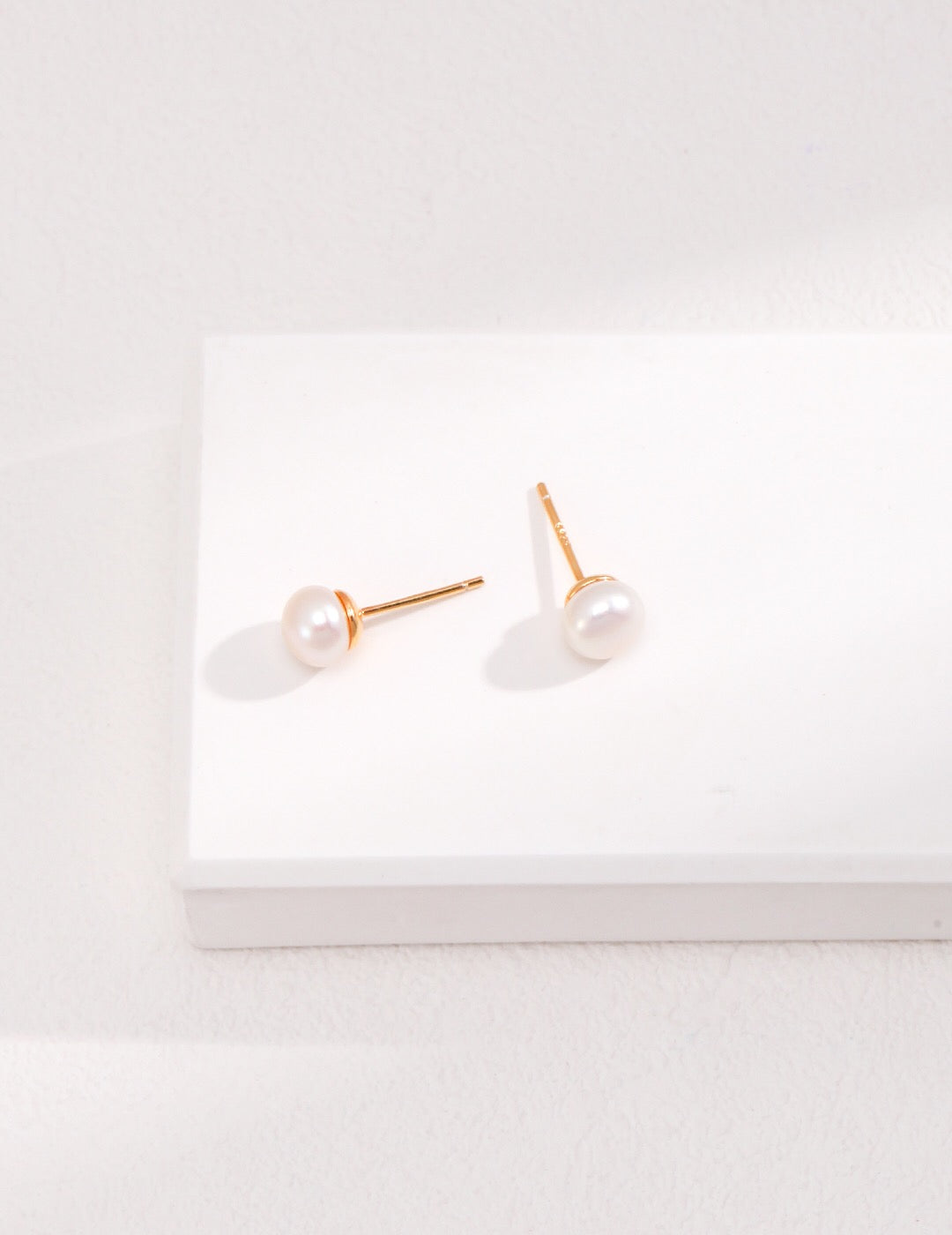 Elegant Long Tassel Pearl Earrings featuring genuine freshwater pearls and gold vermeil, showcasing a beautiful design perfect for any occasion.