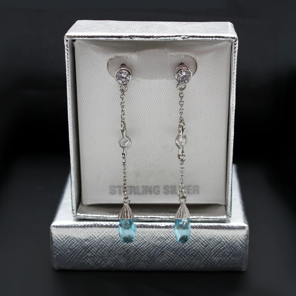 Elegant Rhodium 925 Sterling Silver Earrings featuring a genuine London Blue stone, showcasing a sophisticated design.