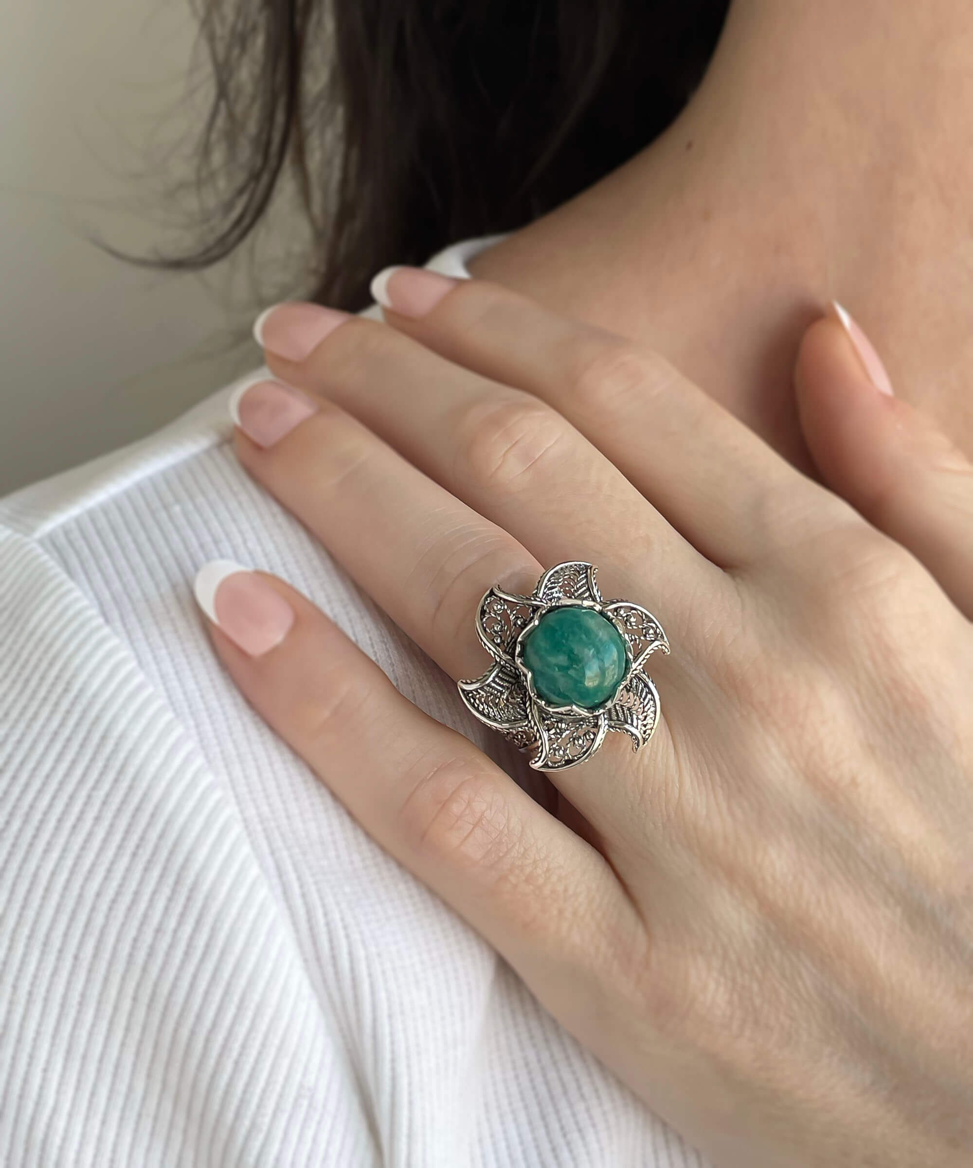 Elegant 925 sterling silver statement ring featuring a 12mm amazonite gemstone and intricate lotus flower filigree design.