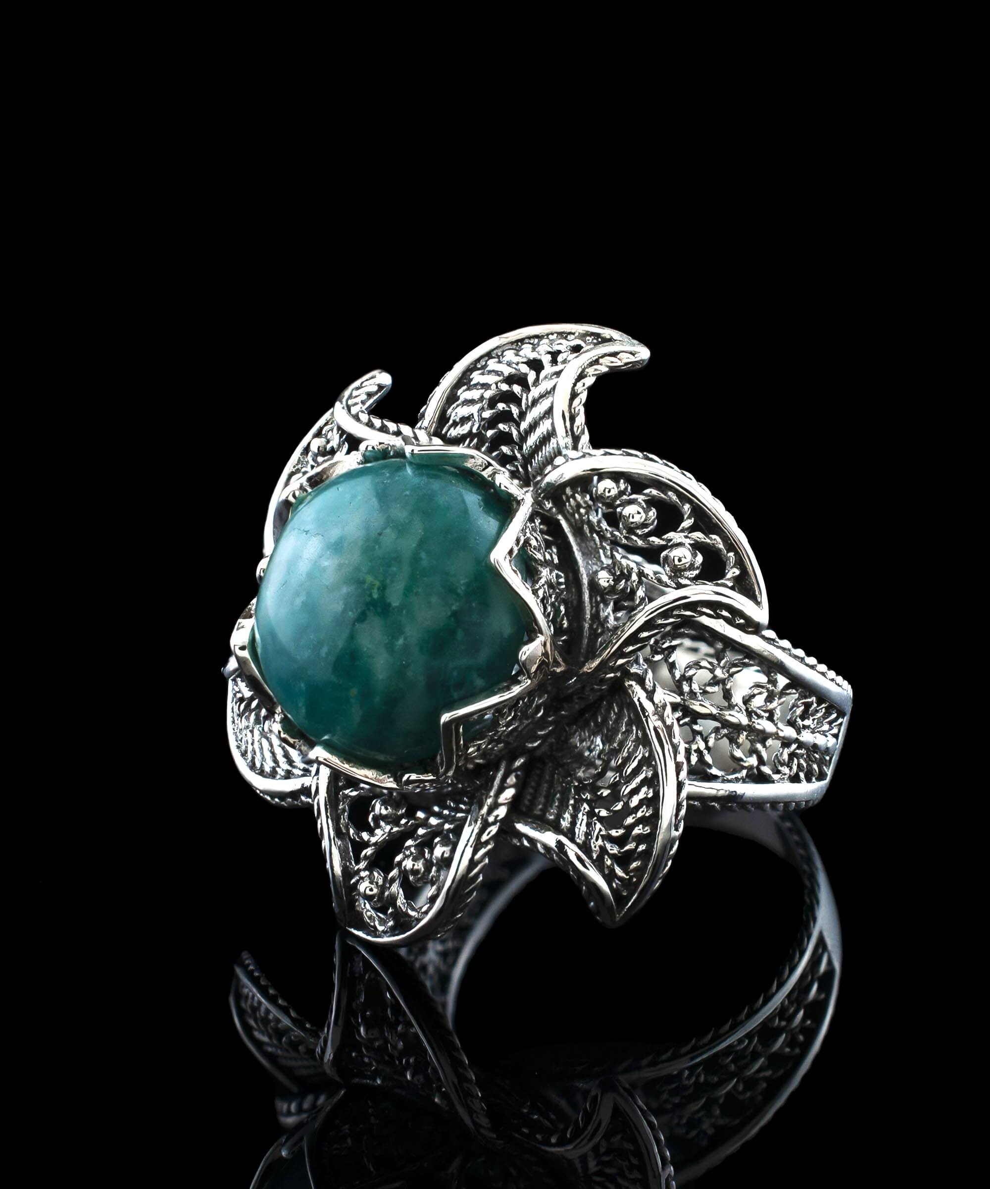 Elegant 925 sterling silver statement ring featuring a 12mm amazonite gemstone and intricate lotus flower filigree design.