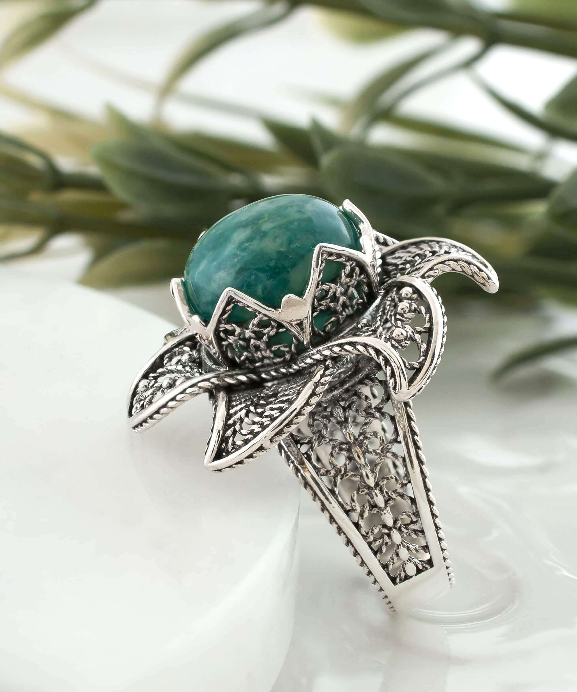 Elegant 925 sterling silver statement ring featuring a 12mm amazonite gemstone and intricate lotus flower filigree design.