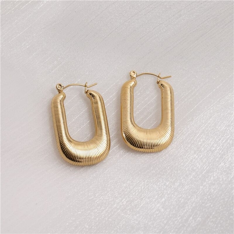 Louvre U Form Open Threader Hoop Earrings in 18Kt yellow gold and stainless steel, showcasing a unique design.