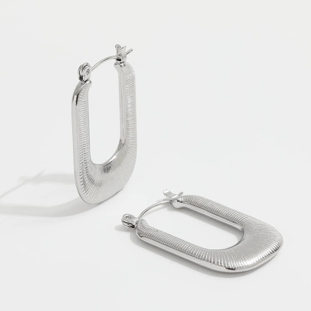 Louvre U Form Open Threader Hoop Earrings in 18Kt yellow gold and stainless steel, showcasing a unique design.