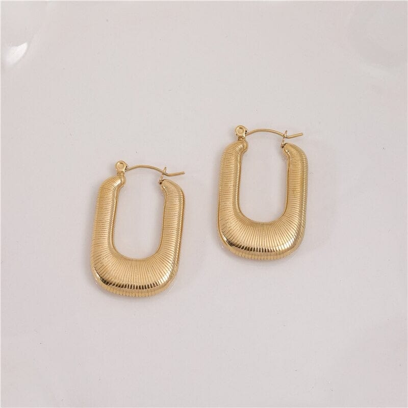 Louvre U Form Open Threader Hoop Earrings in 18Kt yellow gold and stainless steel, showcasing a unique design.