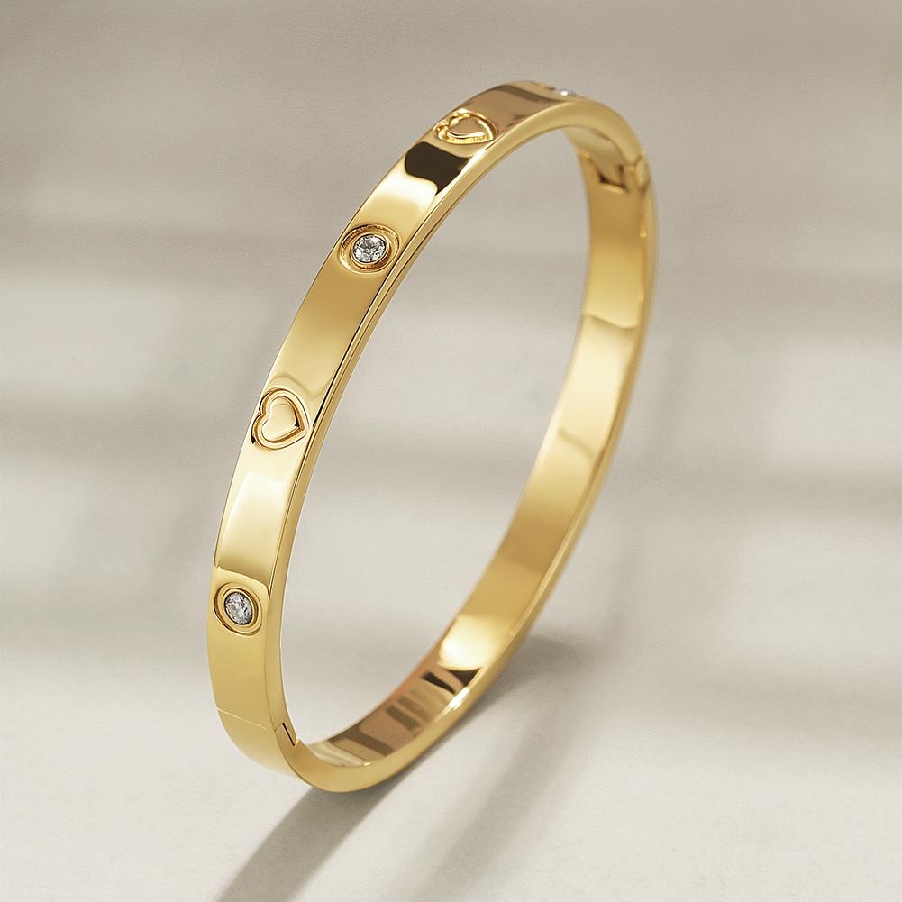 LOVE BANGLE BRACELET made of 316L surgical stainless steel with 14K gold PVD plating, showcasing its elegant design.