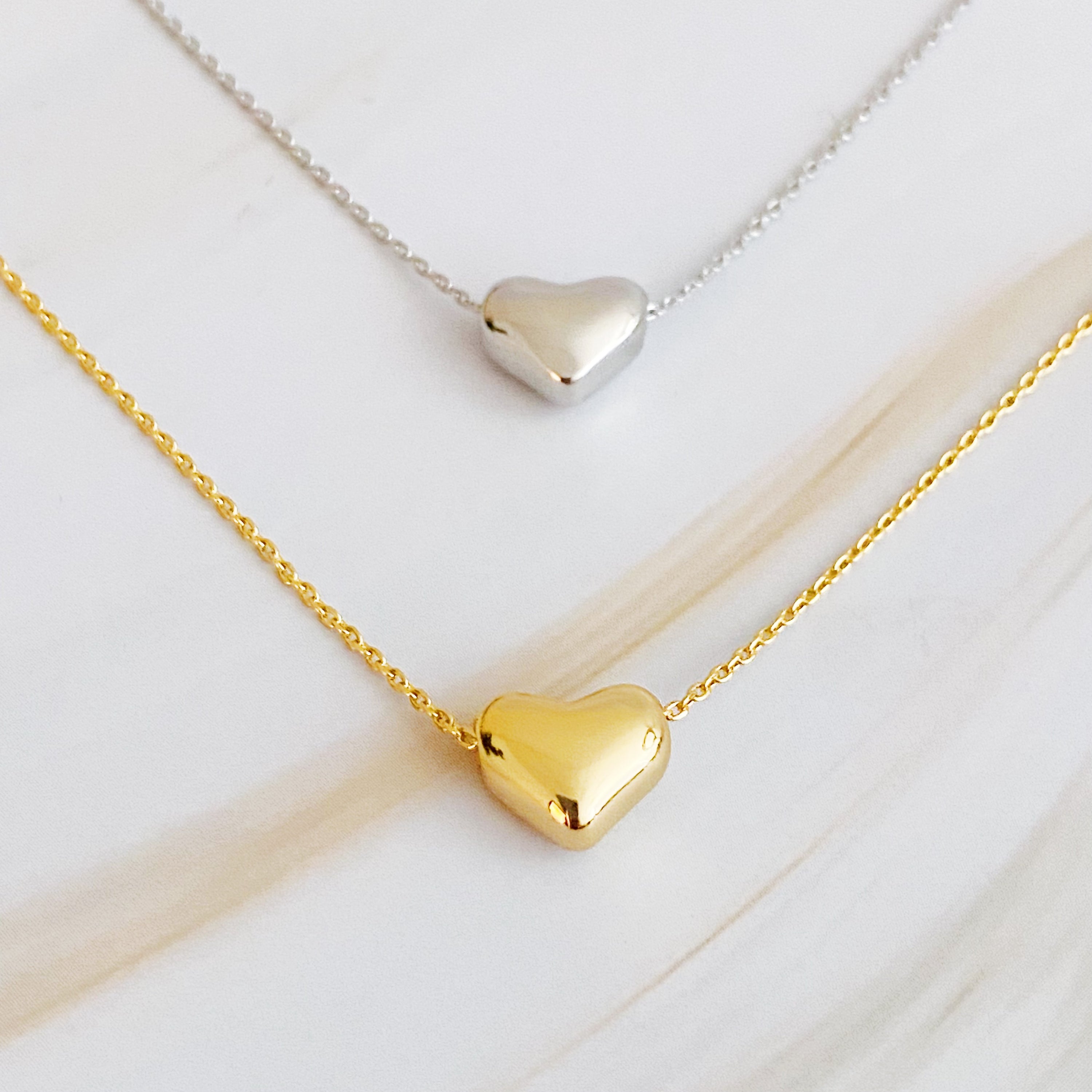 Love Bean Heart Necklace featuring a delicate chain and heart charm, perfect for everyday wear and gifting.