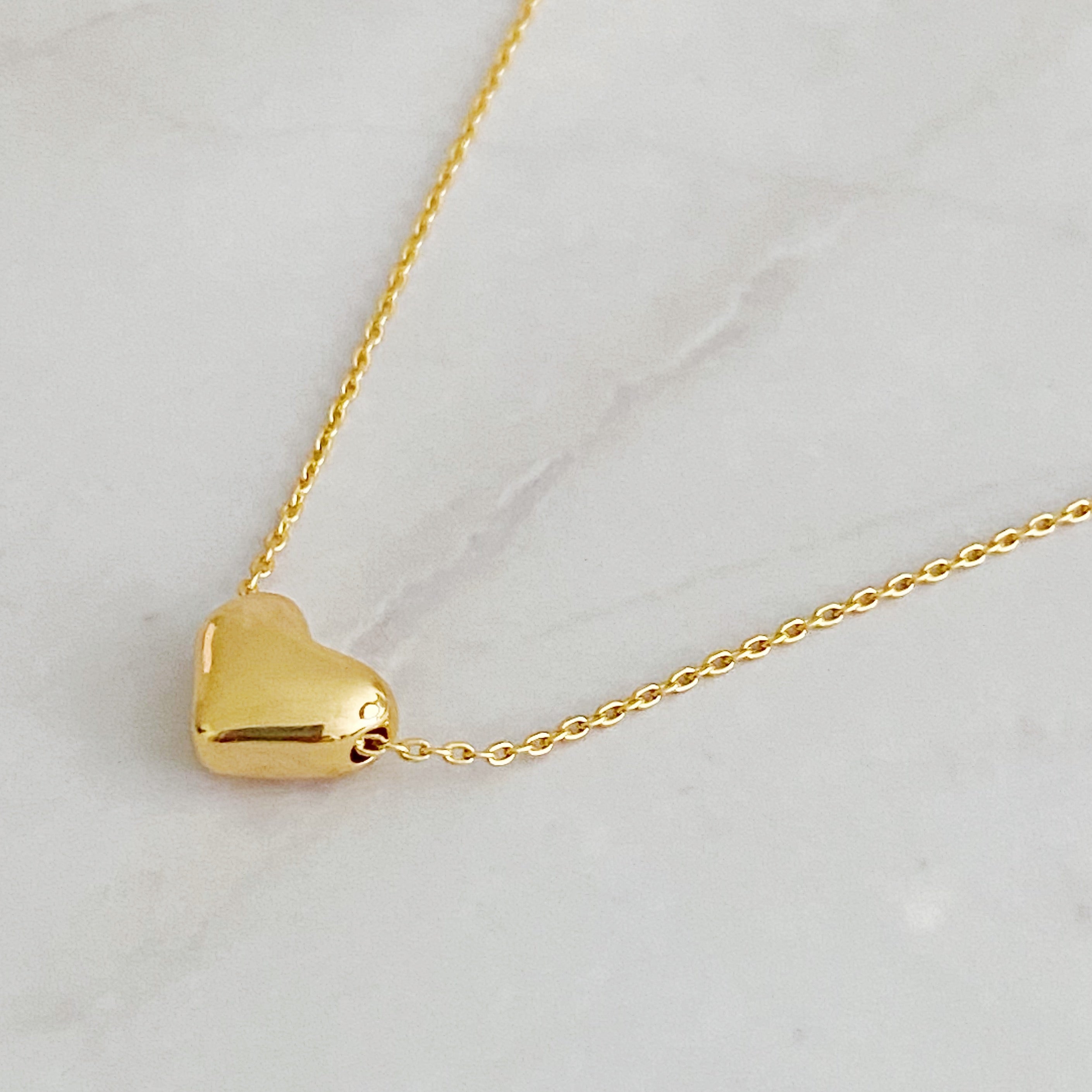 Love Bean Heart Necklace featuring a delicate chain and heart charm, perfect for everyday wear and gifting.