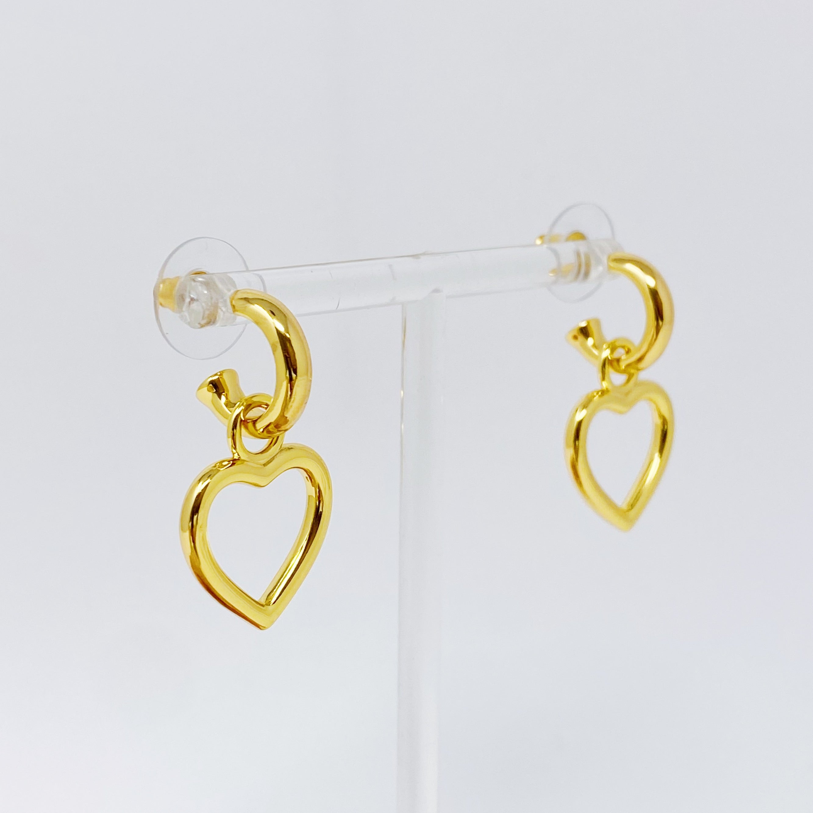 Love From Milan Heart Drop Earrings featuring a trendy dangling heart design in 18K gold plated brass.