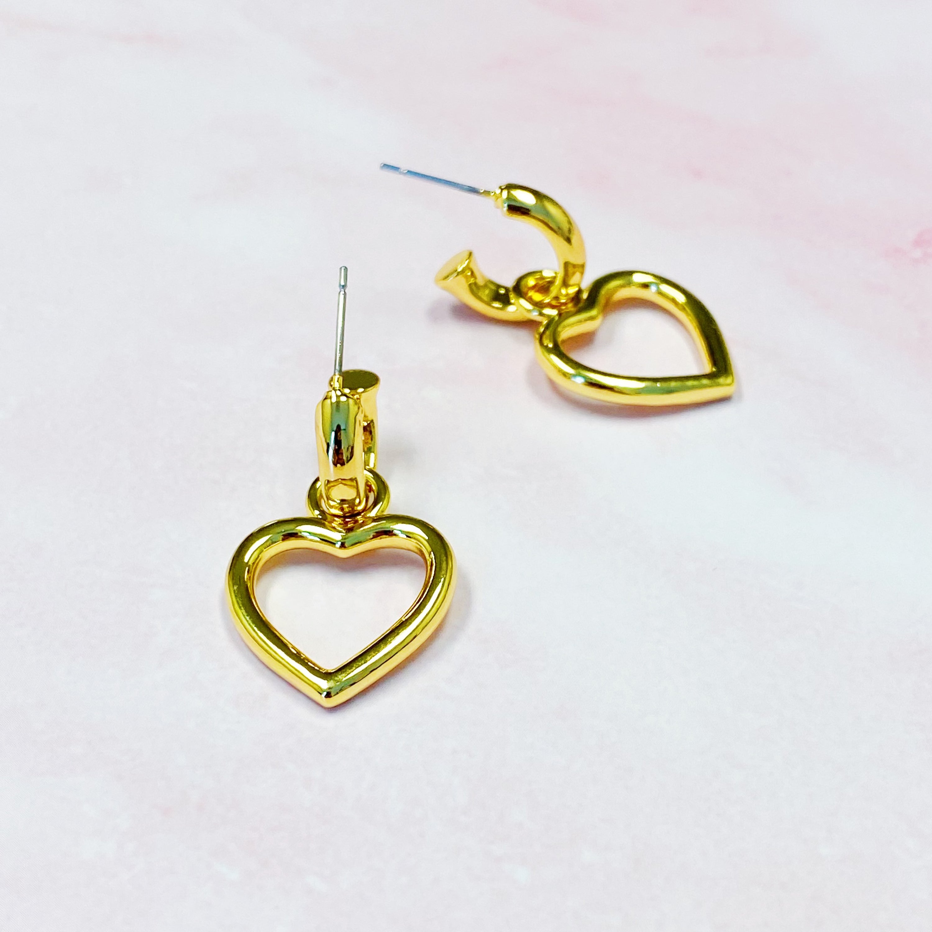 Love From Milan Heart Drop Earrings featuring a trendy dangling heart design in 18K gold plated brass.