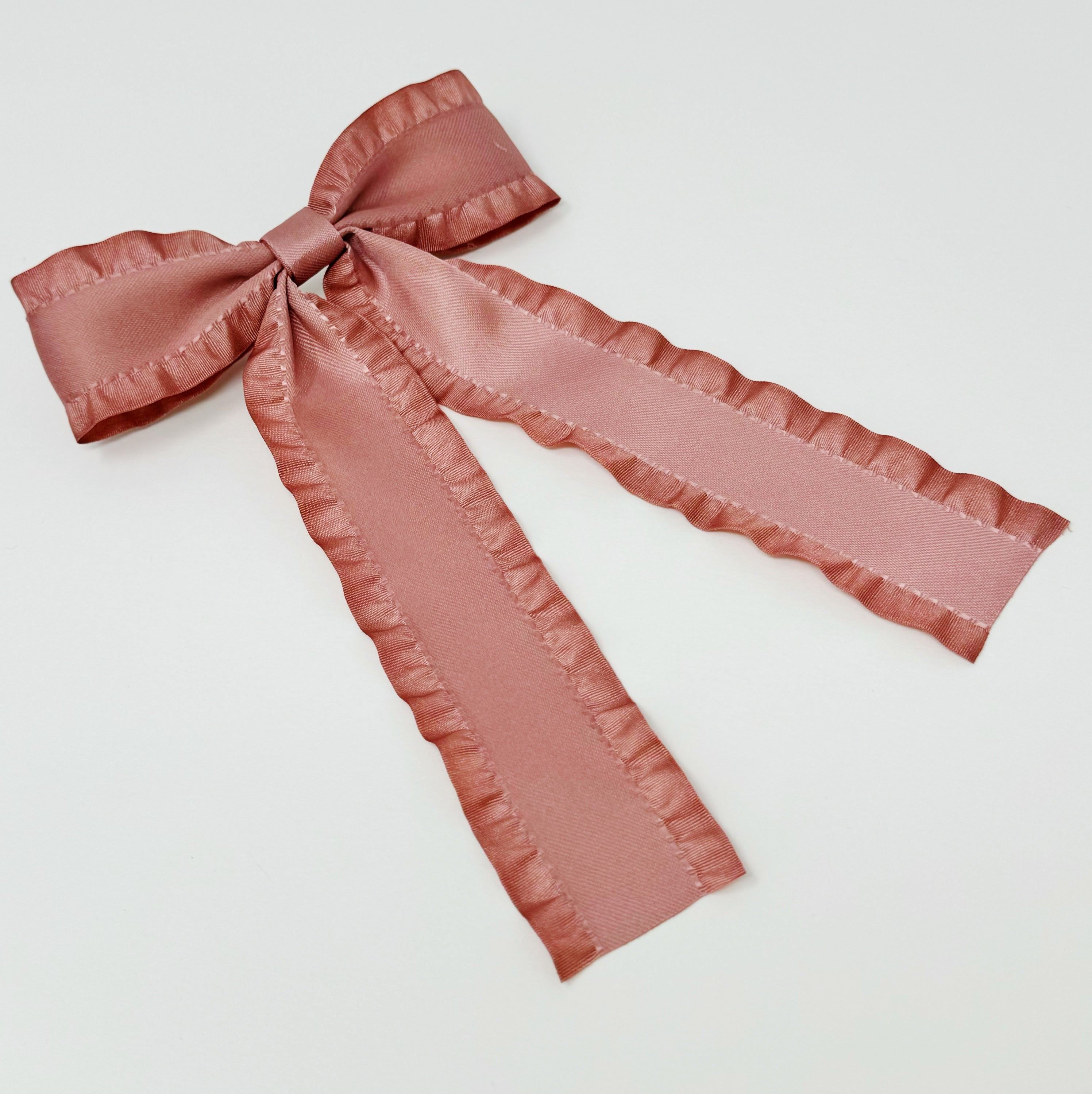 Love Game Frill Bow Hair Clip in vibrant colors with delicate frills, perfect for game days and holidays.