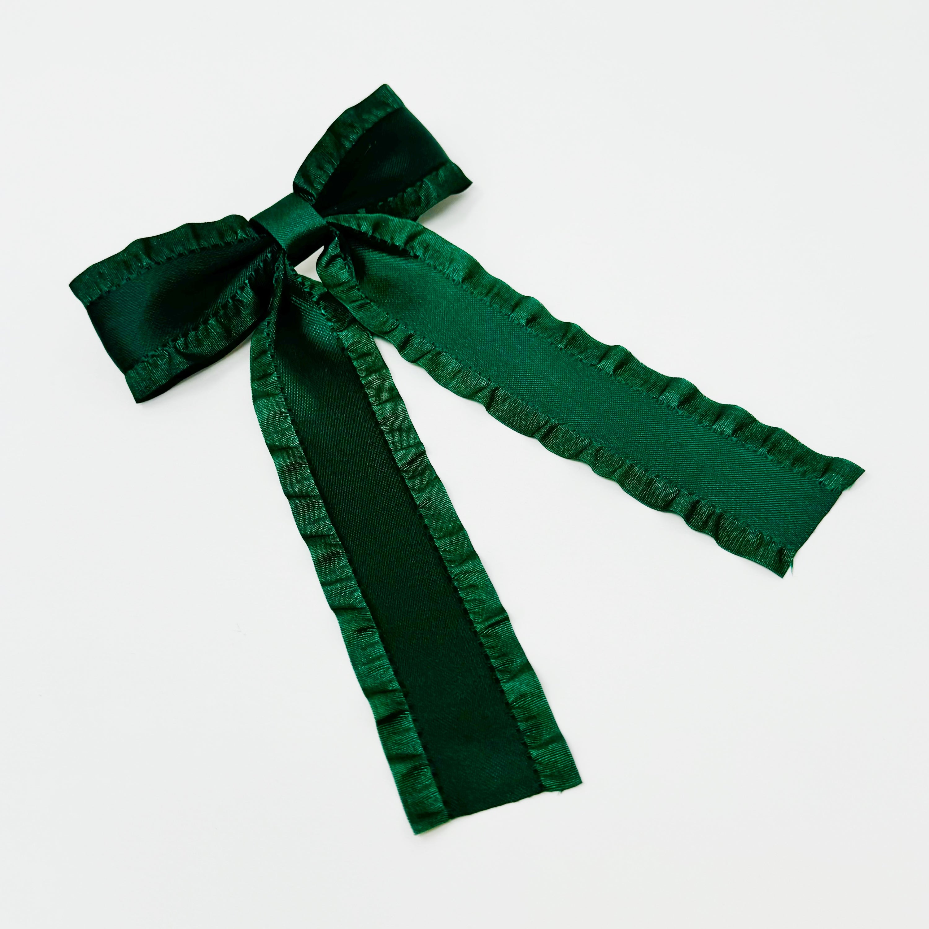 Love Game Frill Bow Hair Clip in vibrant colors with delicate frills, perfect for game days and holidays.