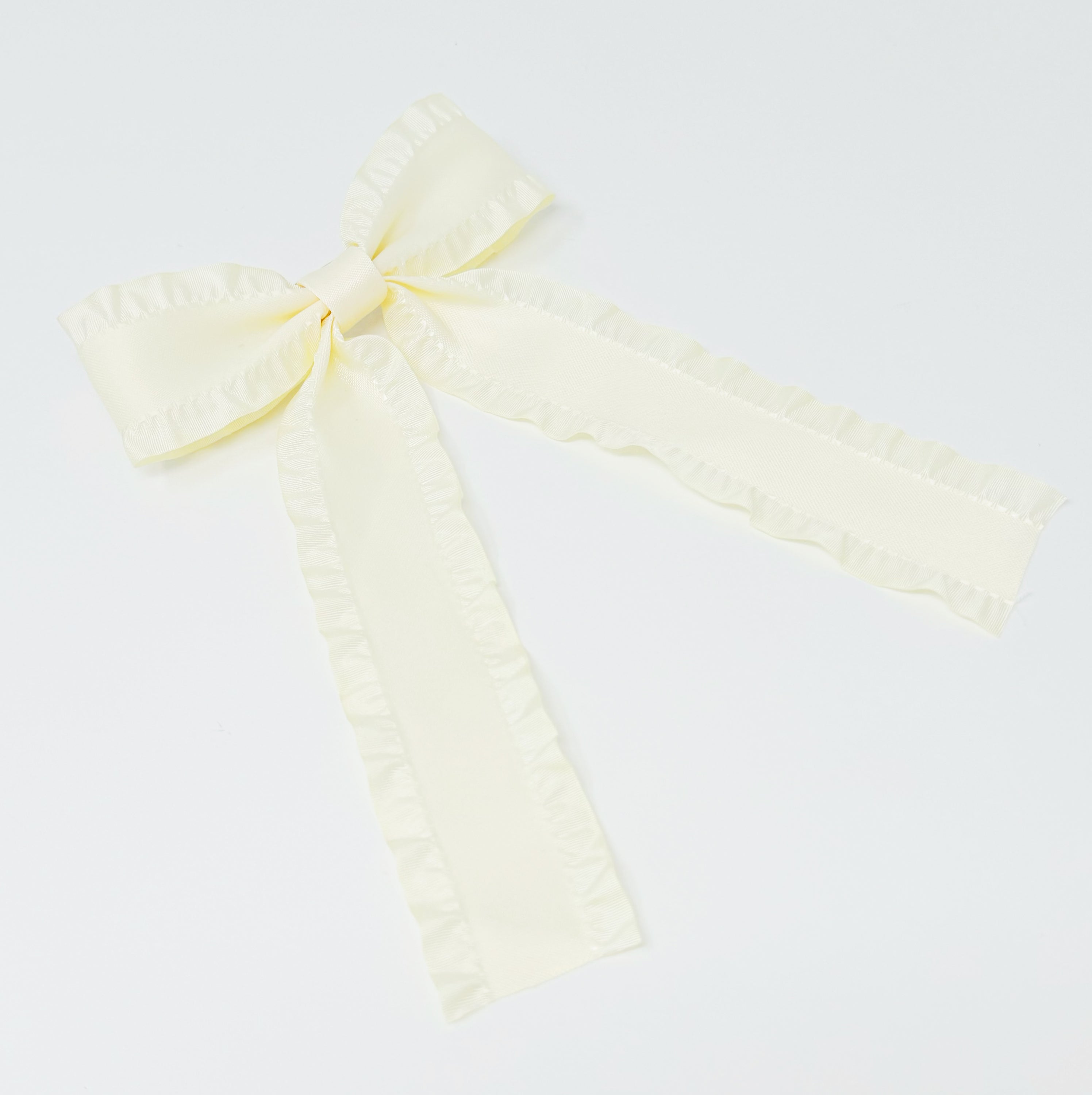 Love Game Frill Bow Hair Clip in vibrant colors with delicate frills, perfect for game days and holidays.