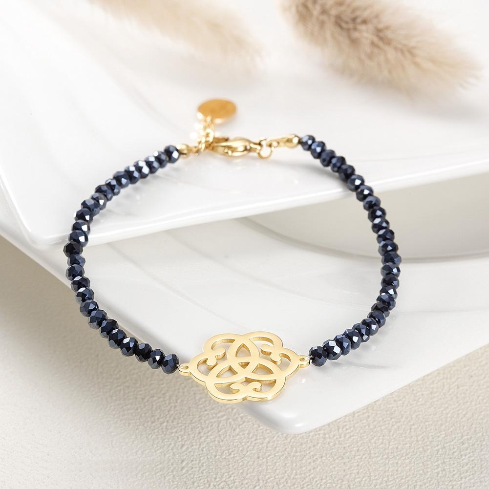 Love Knot Beaded Stone Bracelet made of surgical stainless steel with gold plating, featuring intricate knot design and elegant beaded stones.