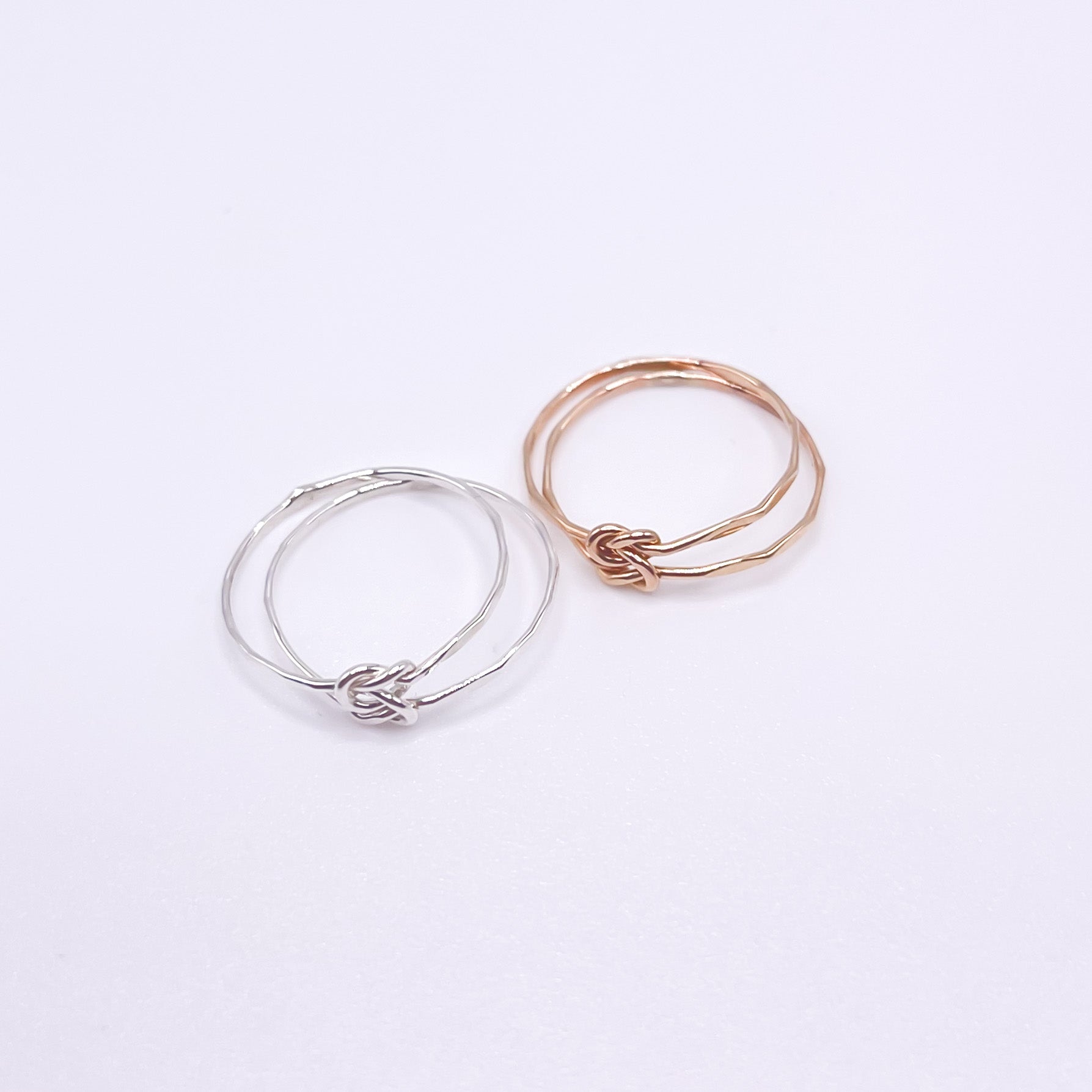 Love Knot Fitted Toe/Midi Ring in sterling silver and gold filled options, featuring two delicate knotted rings.