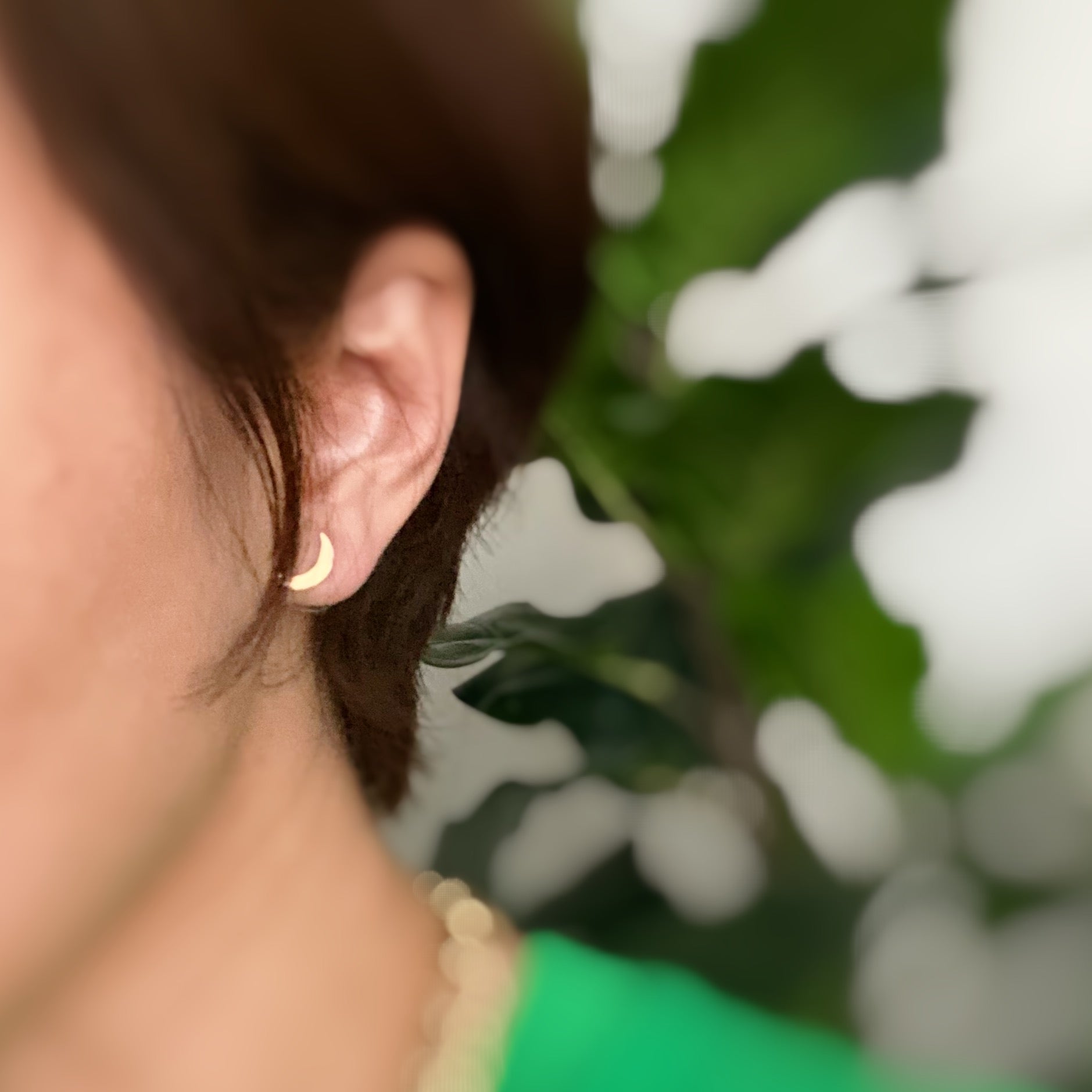 A set of four delicate stud earrings in unique shapes, showcasing 18k gold plating and premium craftsmanship.