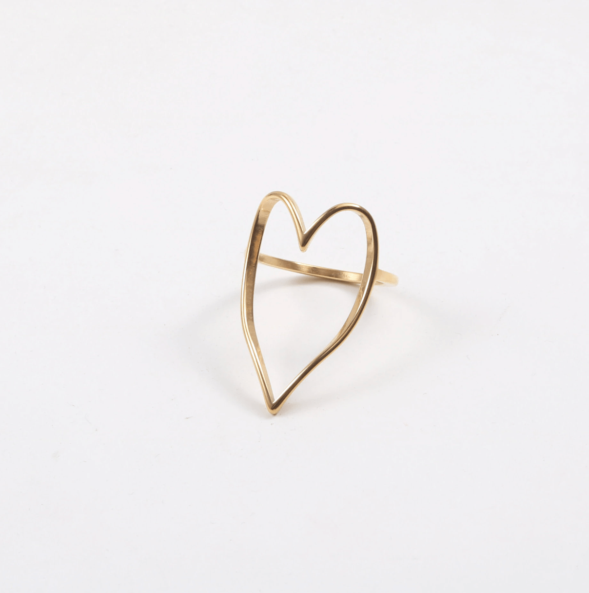 Lovestruck Open Heart Ring featuring a delicate heart design in stainless steel with 18Kt yellow gold PVD plating.