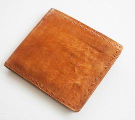 Lucky Boy Billfold Wallet made from vegetable-dyed leather, featuring multiple card slots and a compact design.