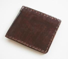 Lucky Boy Billfold Wallet made from vegetable-dyed leather, featuring multiple card slots and a compact design.