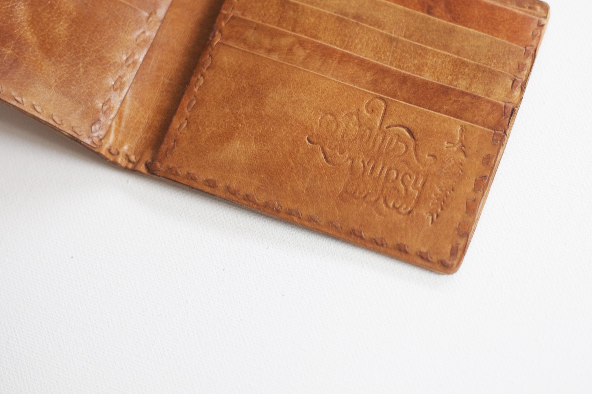 Lucky Boy Billfold Wallet made from vegetable-dyed leather, featuring multiple card slots and a compact design.