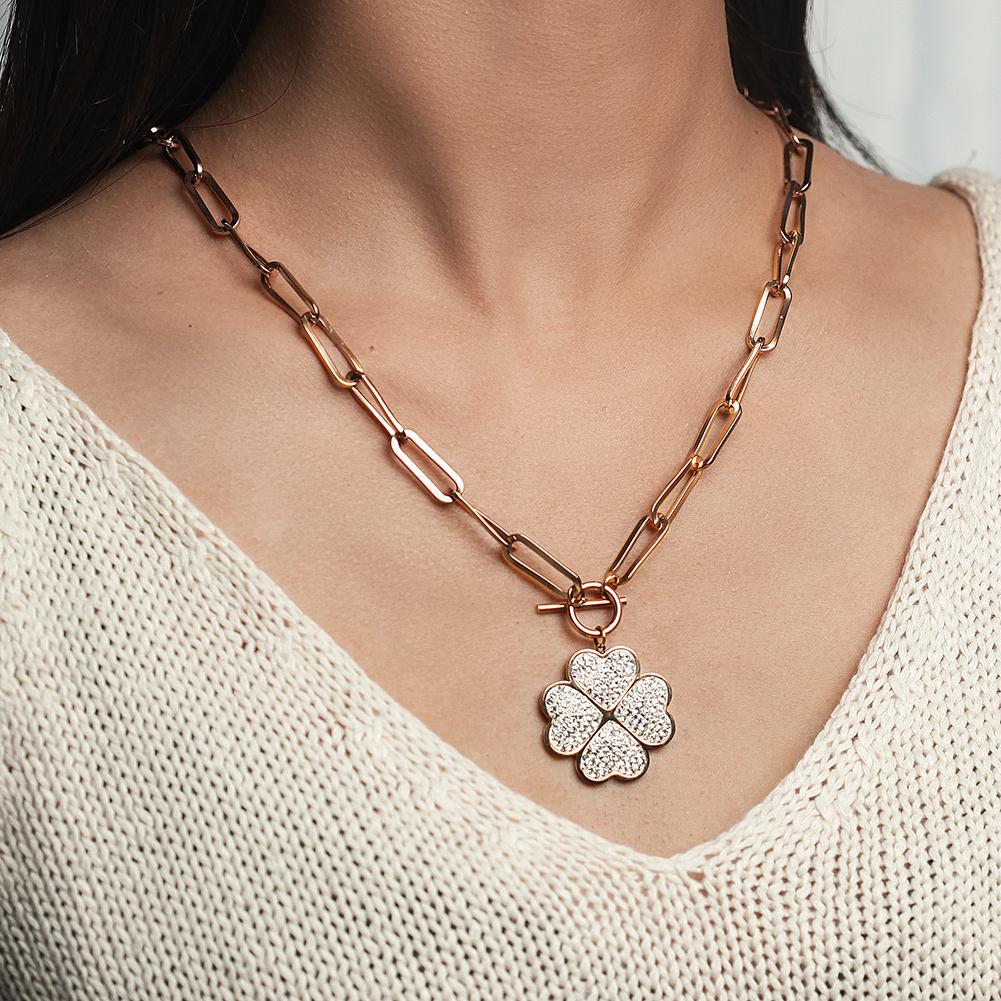 A beautiful Lucky Four-Leaf Charm Necklace made of 316L surgical stainless steel with 14K gold plating, featuring a delicate four-leaf design.