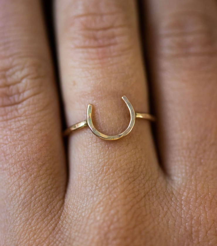 A handmade Lucky Horseshoe Ring crafted from 18 gauge wire, featuring a unique horseshoe design symbolizing good luck.