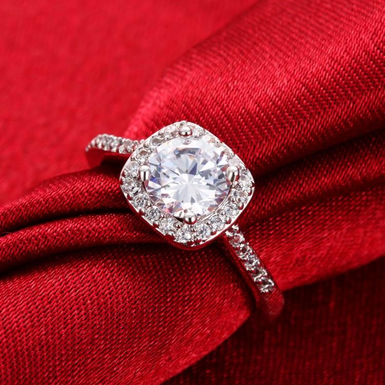 Luminous Vintage 2 Carat Ring featuring a heart & arrow cut simulated diamond set in a 925 sterling silver band, showcasing its elegant design.