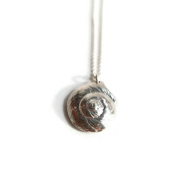 Luna Moon Snail Shell Necklace in sterling silver with gold plating options, showcasing a beautiful beachcomber's treasure design.