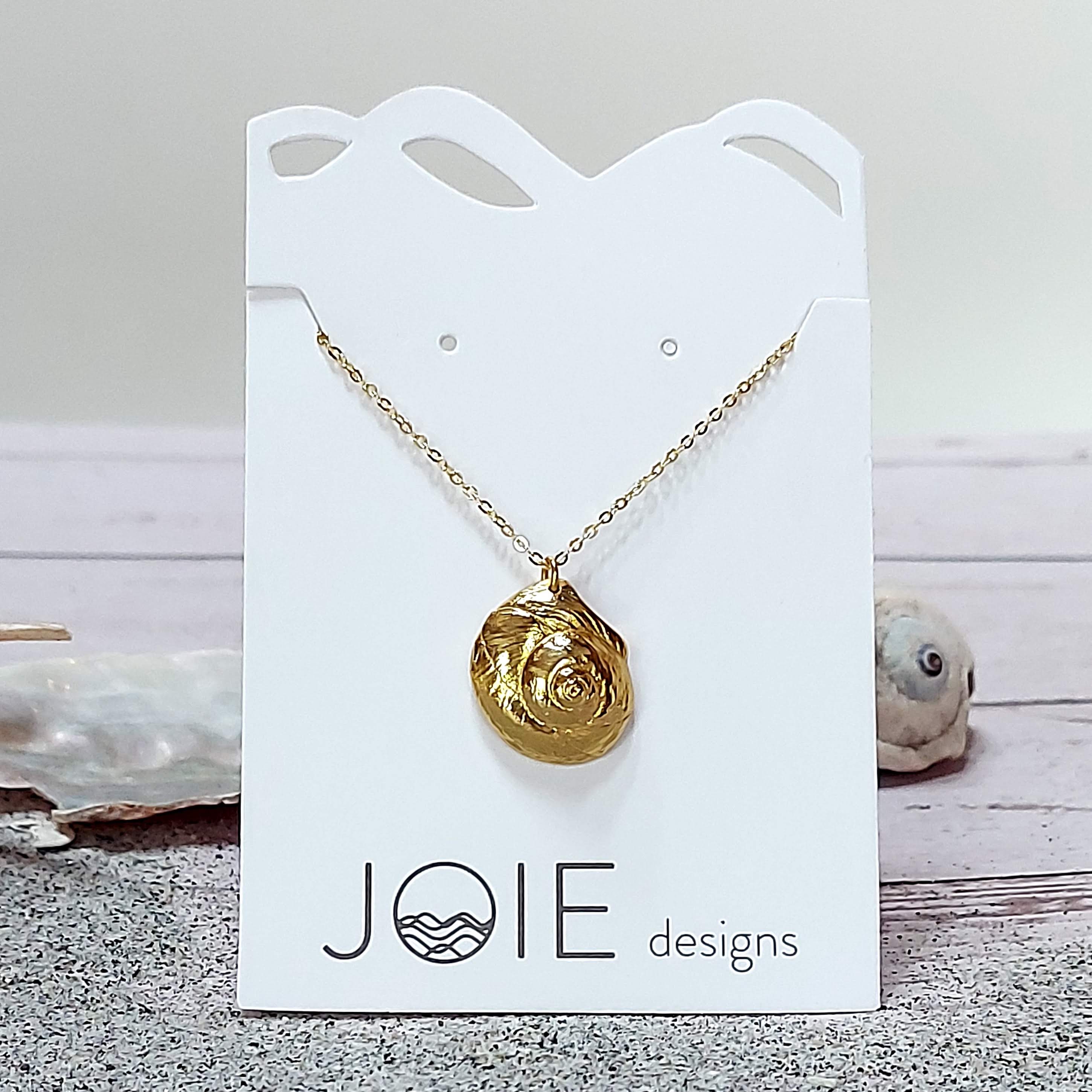 Luna Moon Snail Shell Necklace in sterling silver with gold plating options, showcasing a beautiful beachcomber's treasure design.