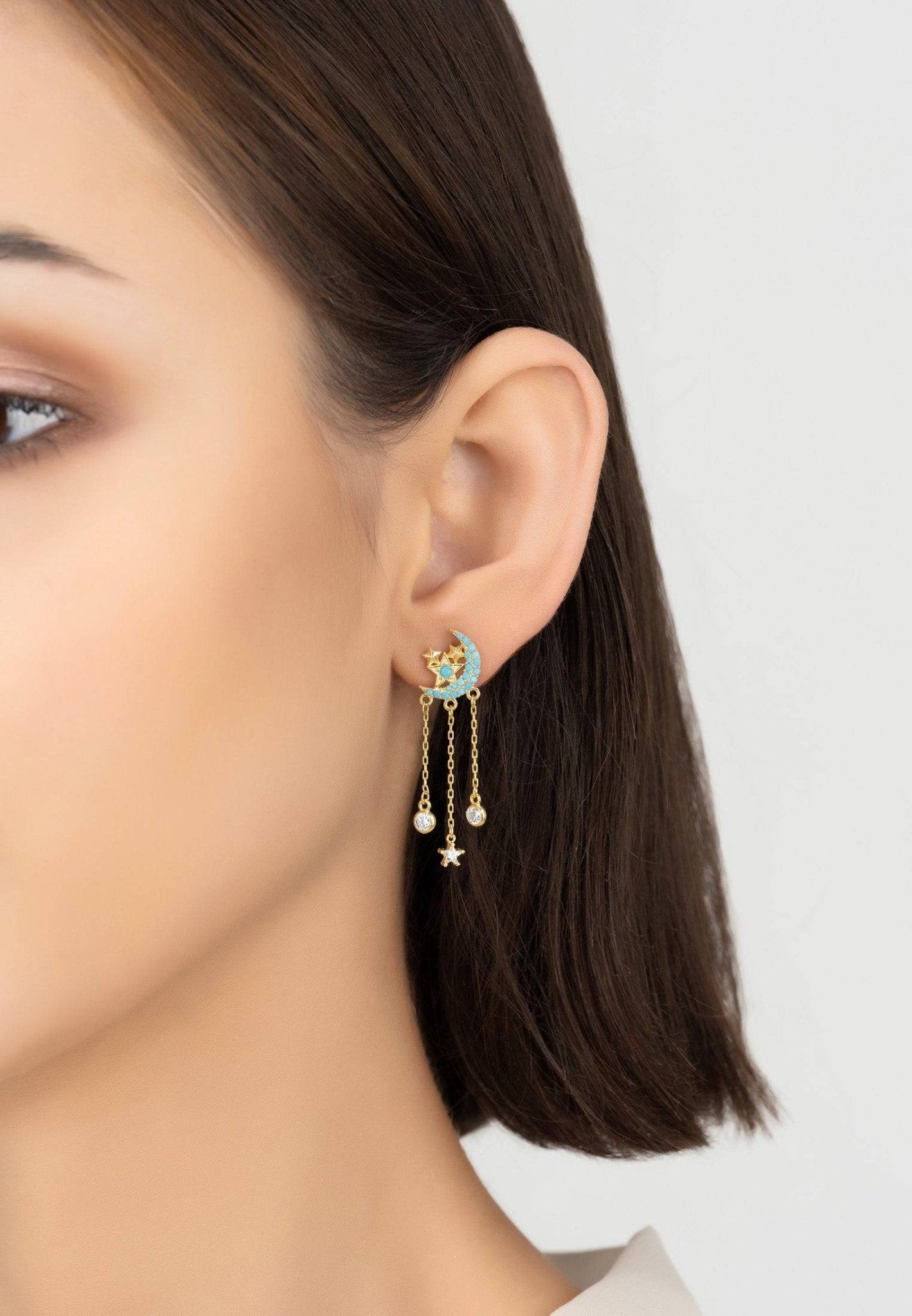 Lunar Moon Chain Drop Earrings featuring gold crescent moon and turquoise zircon stars, elegantly designed with dangling chains.