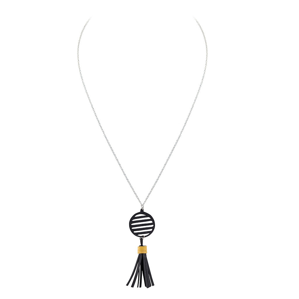 Lunar Rubber Tassel Necklace featuring reclaimed rubber and a colorful tassel, elegantly displayed on a neutral background.