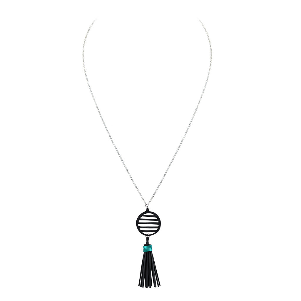 Lunar Rubber Tassel Necklace featuring reclaimed rubber and a colorful tassel, elegantly displayed on a neutral background.