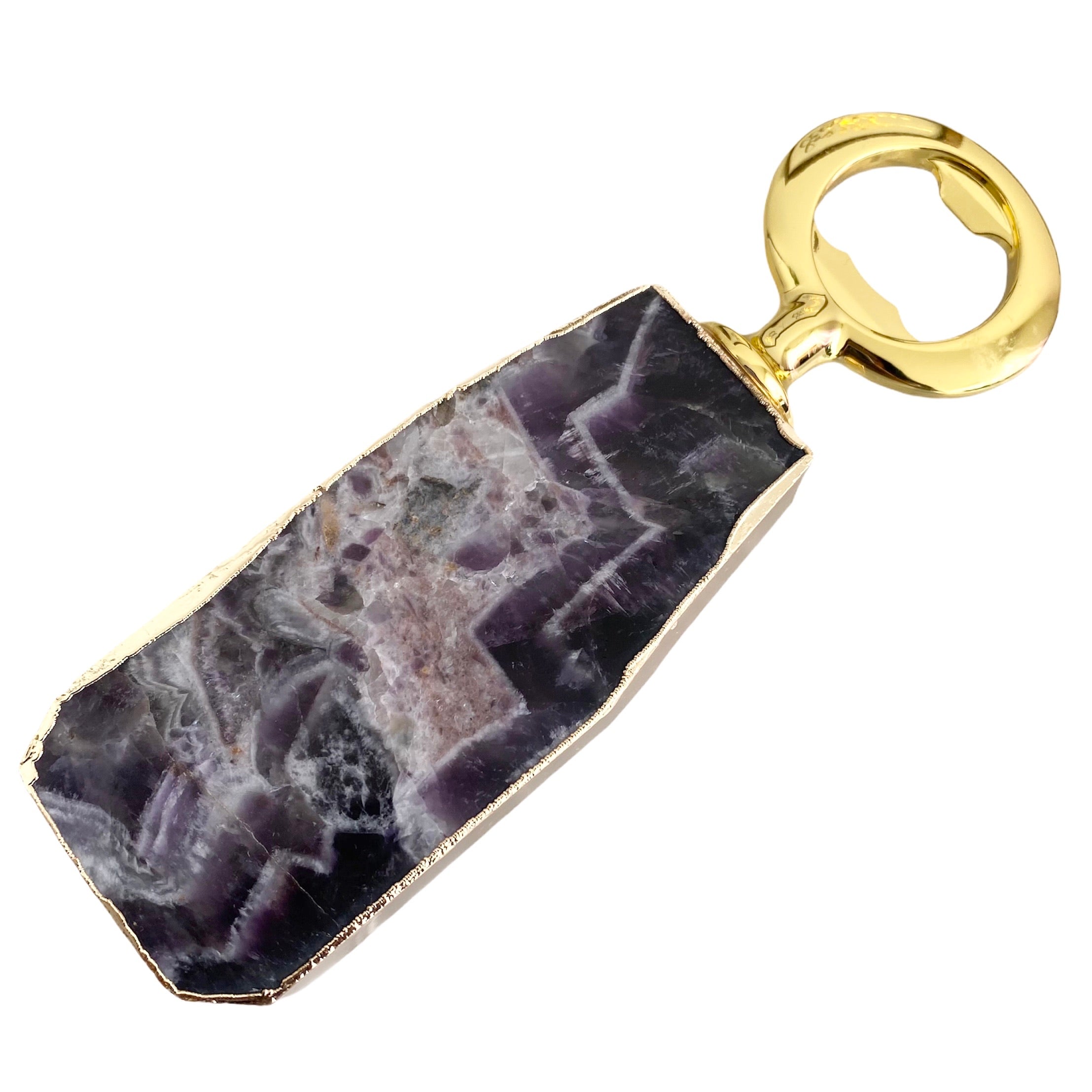 Luxe Gemstone Bottle Opener with amethyst handle and gold plated metal opener, elegantly displayed.