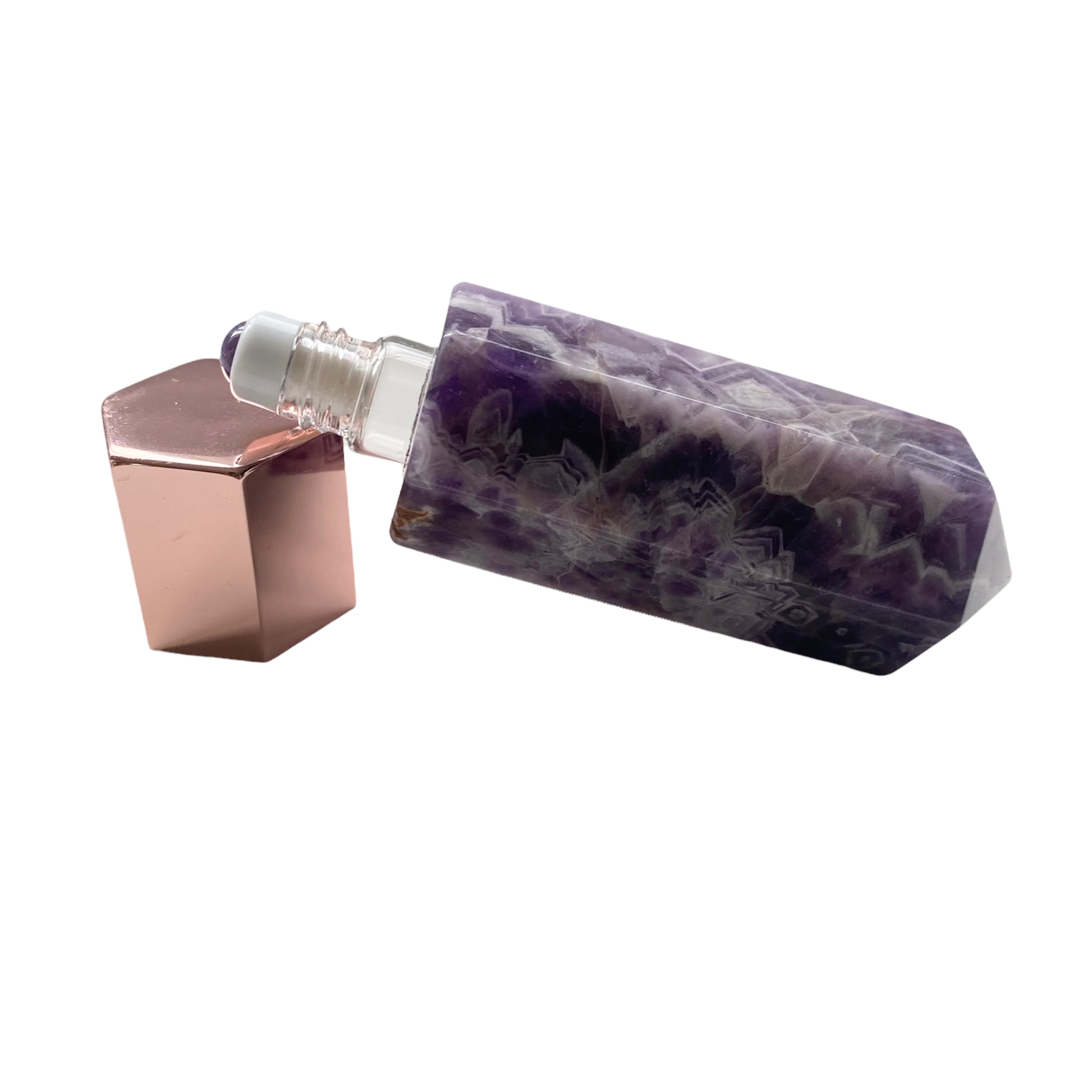 A luxurious gemstone perfume bottle featuring a stunning gemstone point roller design, available in Opalite, Amethyst, Rose Quartz, and Green Fluorite.