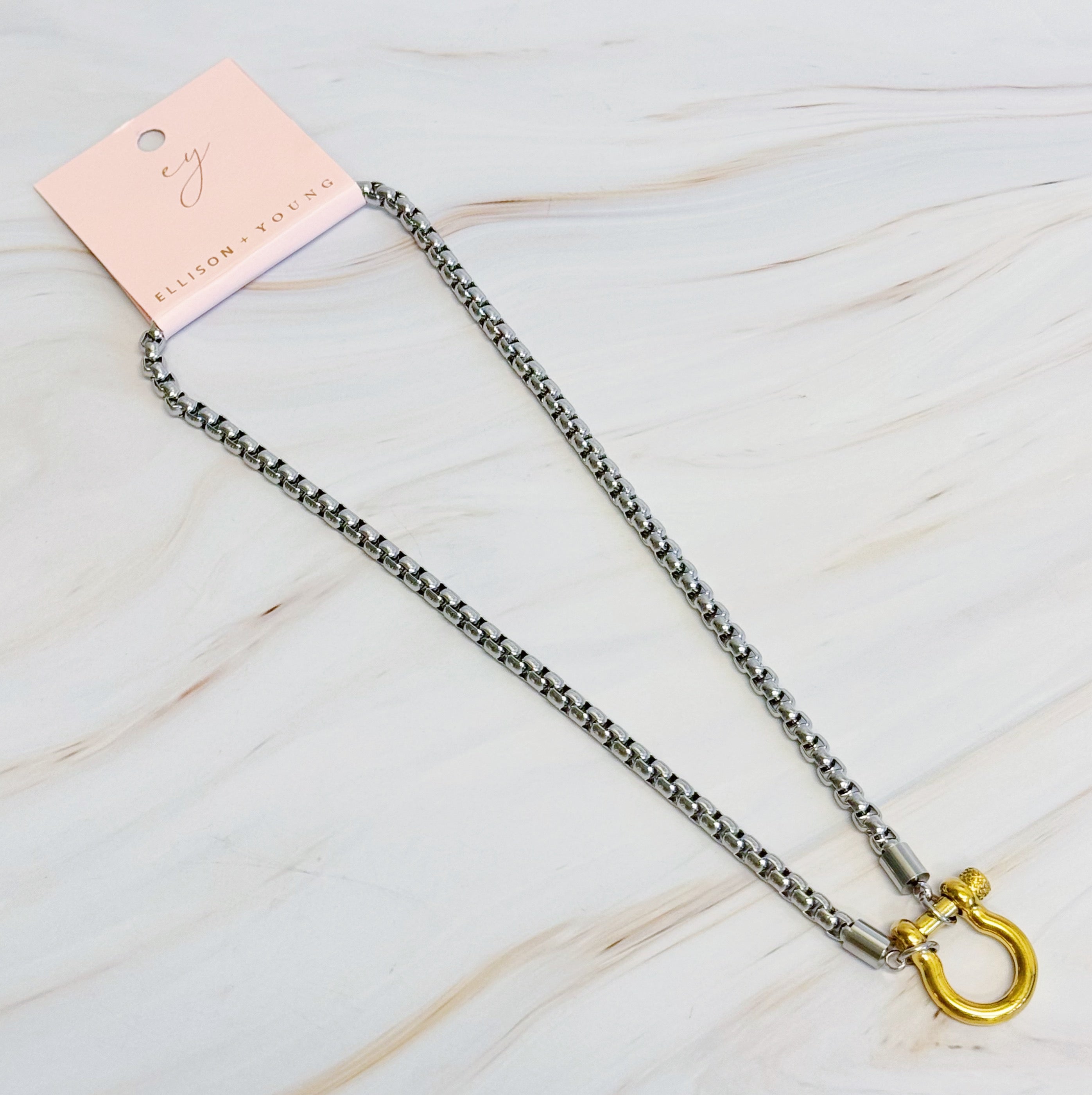 Luxe Pendant Box Chain Necklace featuring a sleek box chain and unique pendant, elegantly displayed on a soft background.