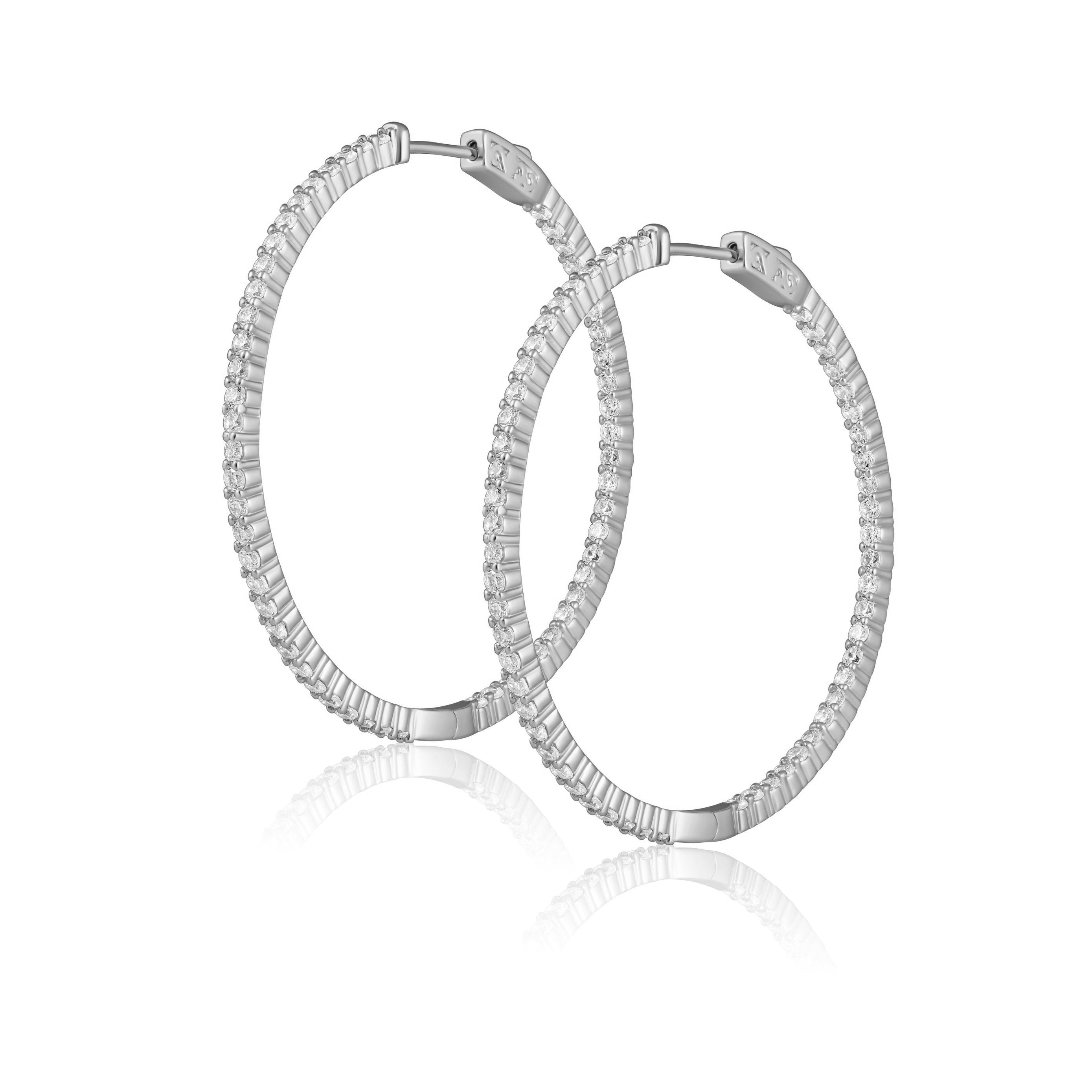 Elegant Lyra CZ Hoop earrings featuring 14k gold plating and sparkling CZ stones, perfect for any occasion.