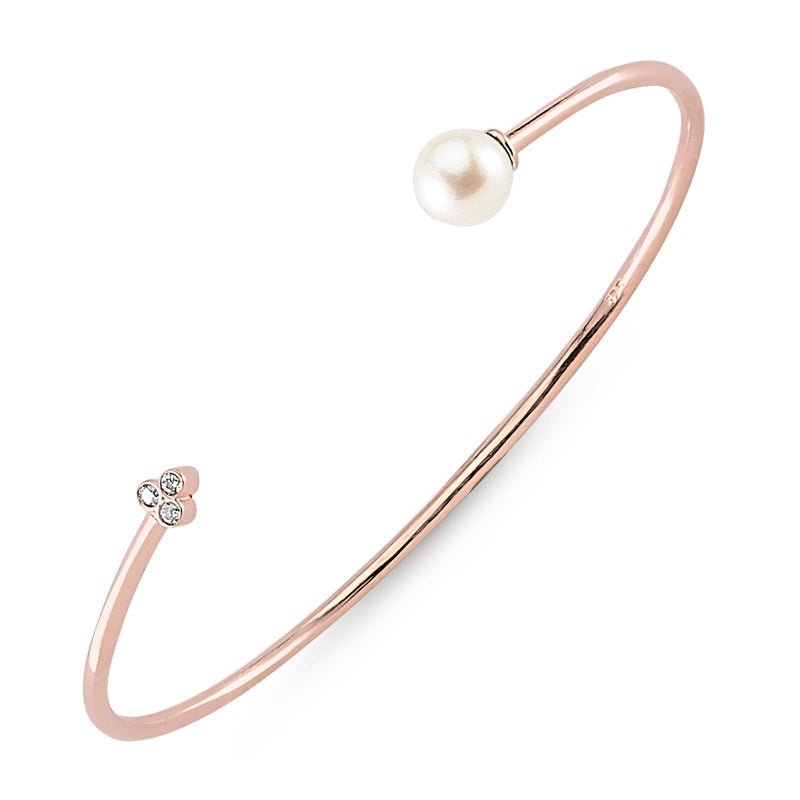 Lyra Silver Pearl Bracelet Cuff featuring 925 sterling silver, freshwater pearl, and clear CZ crystals in a stylish design.